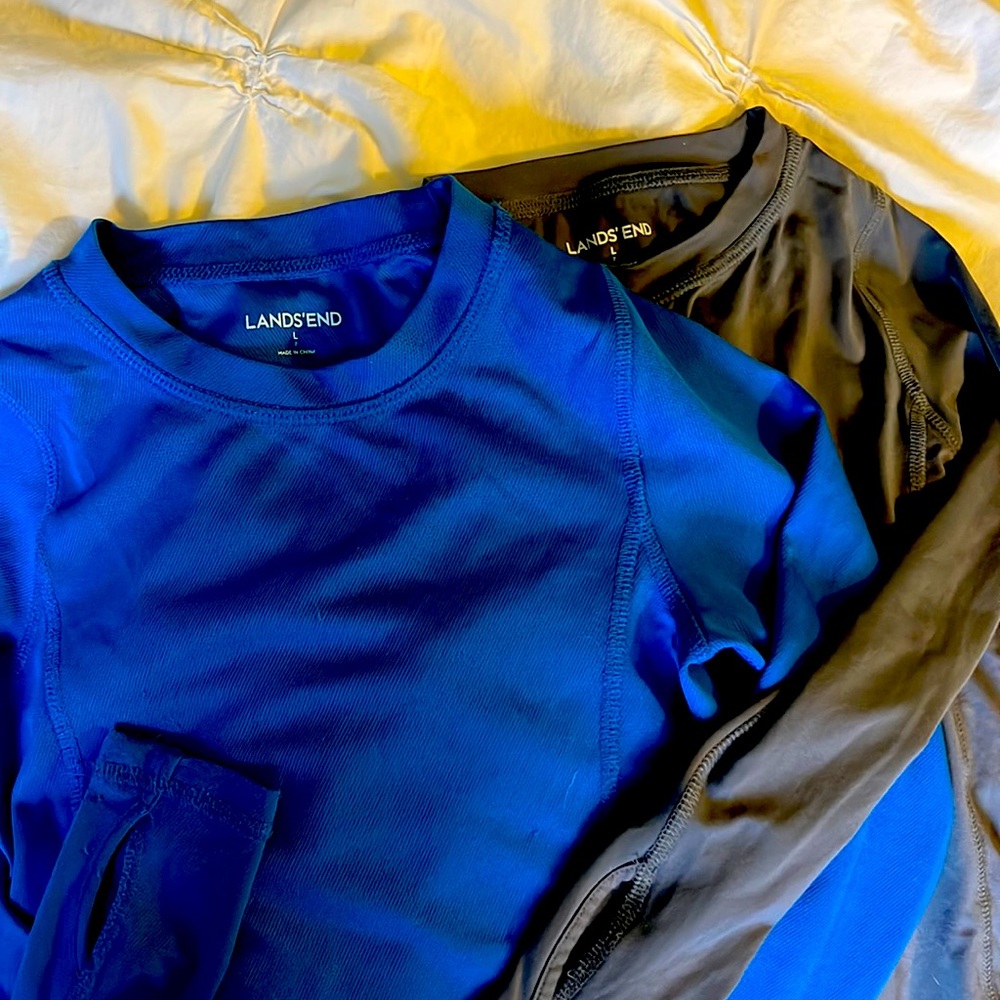 2 pair of Lands End base layers. Size 7.